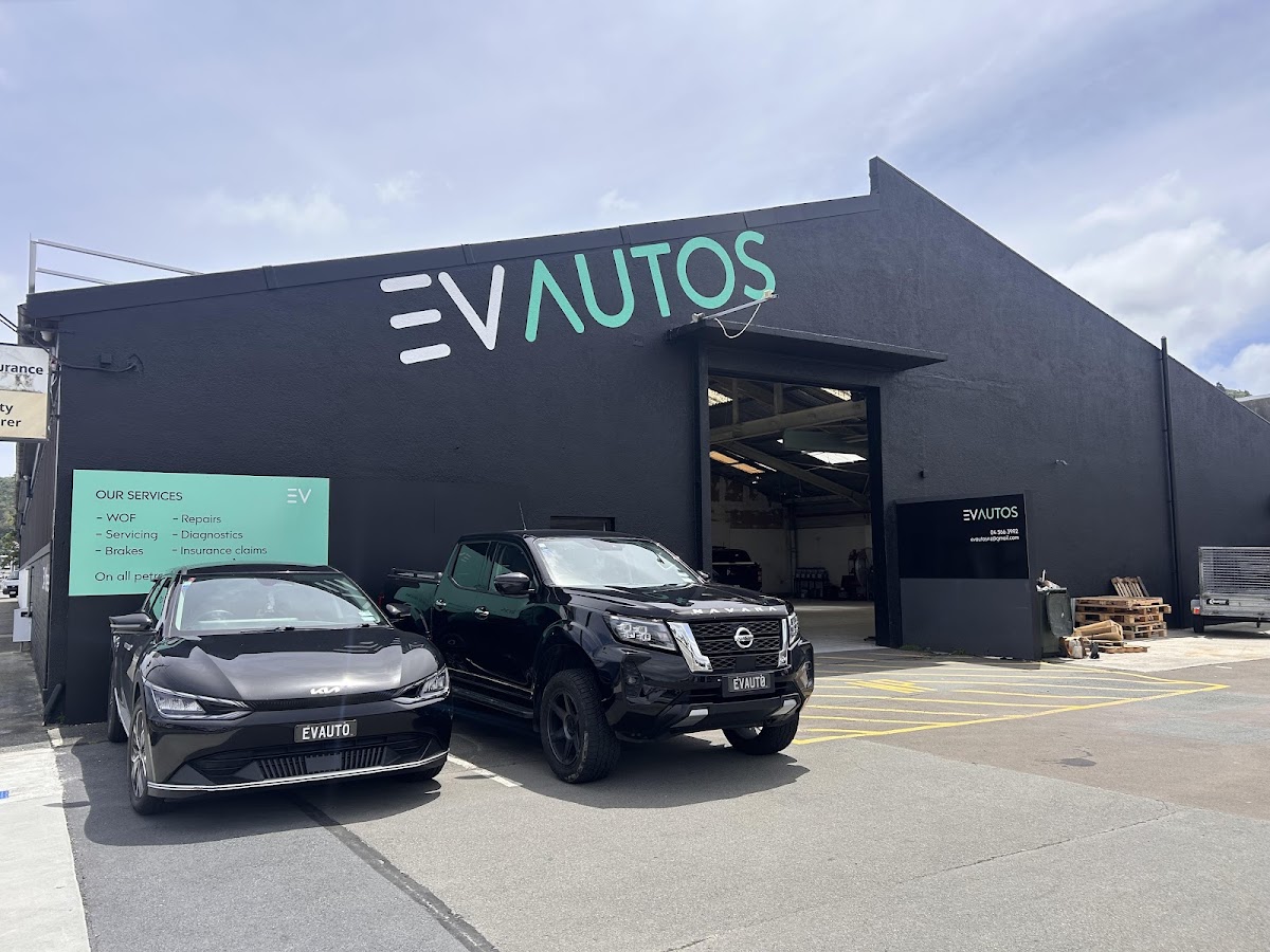 The EV Autos workshop on Wakefield Street with its services board and courtesy cars out front